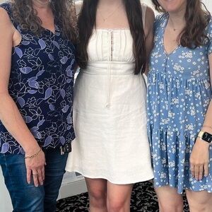 White lace sleeveless babydoll mini sundress with adjusted straps